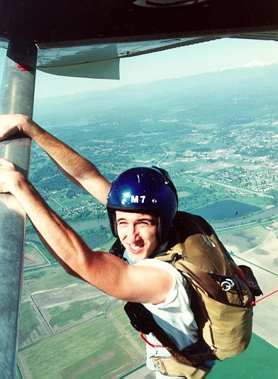 Hanging on the wing of the plane